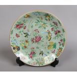 A Cantonese Celadon dish painted with birds and flowers.Condition report intended as a guide only.
