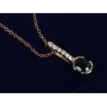 A 9ct gold sapphire and diamond pendant on 9ct gold chain.