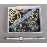 A quantity of mostly paste set costume jewellery brooches etc, along with a ladies Radley dress