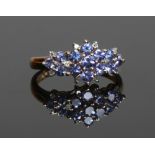 A 9ct gold tanzanite and diamond set dress ring, size L.