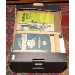 A box of vintage horse race and equestrian books covering various courses and meetings, along with
