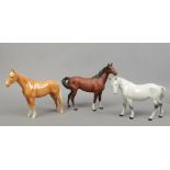 Three Beswick horses to include matt bay and dapple grey examples etc.