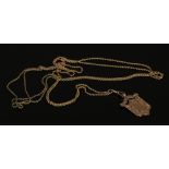 A 9ct gold shield shaped fob 4.8 grams and a 15ct gold ropetwist guard chain 140cm, 10.5 grams.
