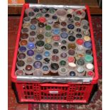 A box of vintage buttons, various styles and colours.