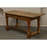 An oak refectory table with one piece top and pegged construction, L 153.5cm x W 73cm x H 74cm.