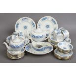 A collection of Coalport teawares and dinnerwares in the Revelry design to include teapots, gravy