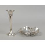 A silver pierced presentation dish 96 grams assayed Sheffield 1968 along with a filled silver
