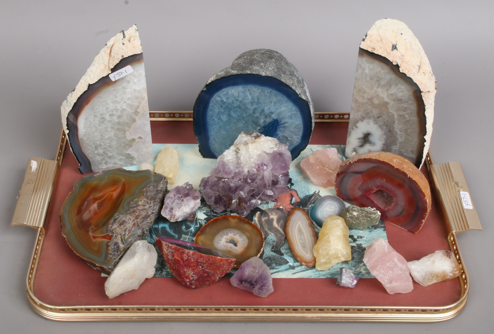 A tray of geological specimens and minerals.