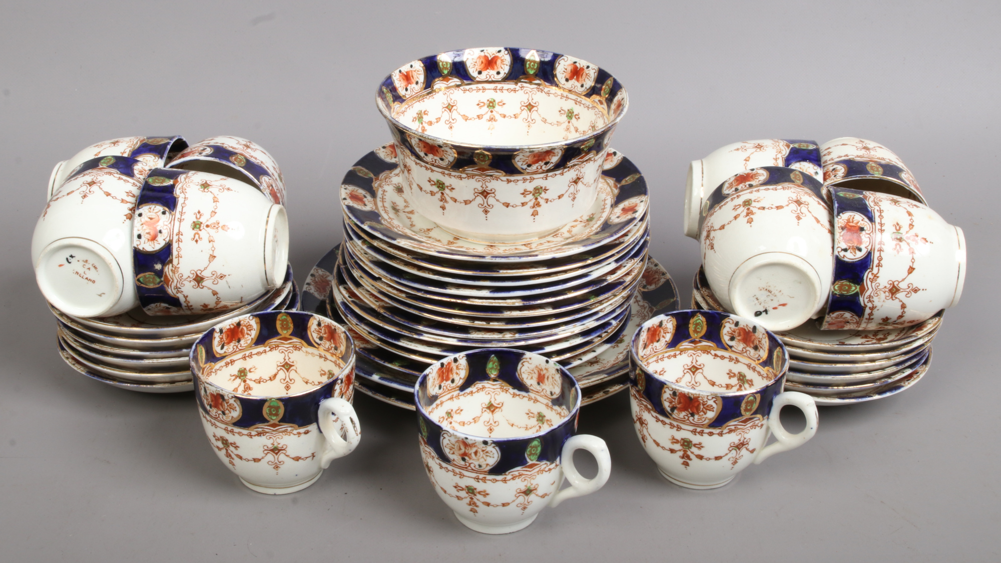 A Stanley china part tea set decorated in the City pattern.