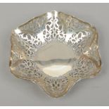 A silver bon bon dish of hexagonal form with pierced decorated assayed Birmingham 1930.