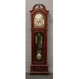 A modern hardwood C. Wood & Son 31 day longcase clock.