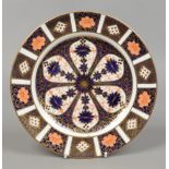 A Royal Crown Derby Imari pattern plate. diameter 21cm.