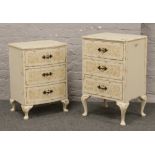 Two painted bedside chests of three drawers.