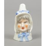 A Royal Worcester porcelain candle snuffer Mrs Caudle. Printed puce mark.Condition report intended