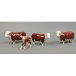 Four Beswick models of Hereford cattle, two bulls, cow and calf including Champion of Champions.