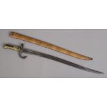 A French World War I M1874 pattern bayonet in steel scabbard, 57cm blade.