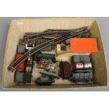 A collection of vintage model railway to include track, Hornby platform, TTR engine and wagons etc.