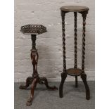 A carved oak barleytwist two tier plantstand along with a carved mahogany plantstand for repair.
