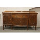 A George V carved mahogany breakfront sideboard raised on square tapering legs, H 98cm x L 181cm x D