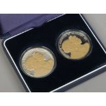 A cased pair of Westminster commemorative five pound coins, 2012 for Jersey and Guernsey.