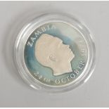A cased Royal Mint Zambia one Kwacha commemorating the 10th Anniversary of Independence.