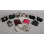 Collection of assorted hip flasks including leather mounted examples.
