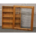 A pine wall hanging display case.