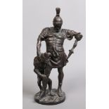 A large bronze figure formed as a Roman gladiator in battle with a lion.