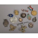 A quantity of collectables including brass compass fob, commemorative medal, fox themed bar