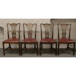 A good set of eight Hepplewhite style George V dining chairs with ox blood leather seats including a