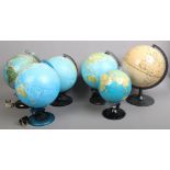 Six modern globes including illuminating examples.