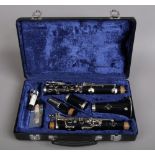 A hard cased Buffet Crampon B12 clarinet with spare reeds cork grease made in Paris France.