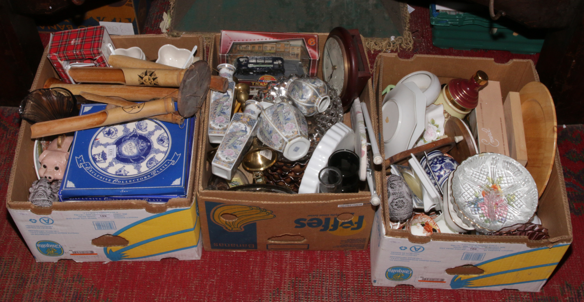 Three boxes of miscellaneous to include cabinet plates, brass candlesticks, Chesterfield wall