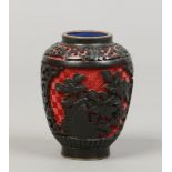 A small 20th century Chinese red and black cinnabar lacquer vase, 7.75cm.Condition report intended