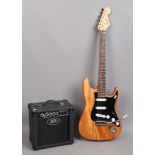 A Fender Squire Stratocaster style electric guitar with a Peavey back stage amplifier.