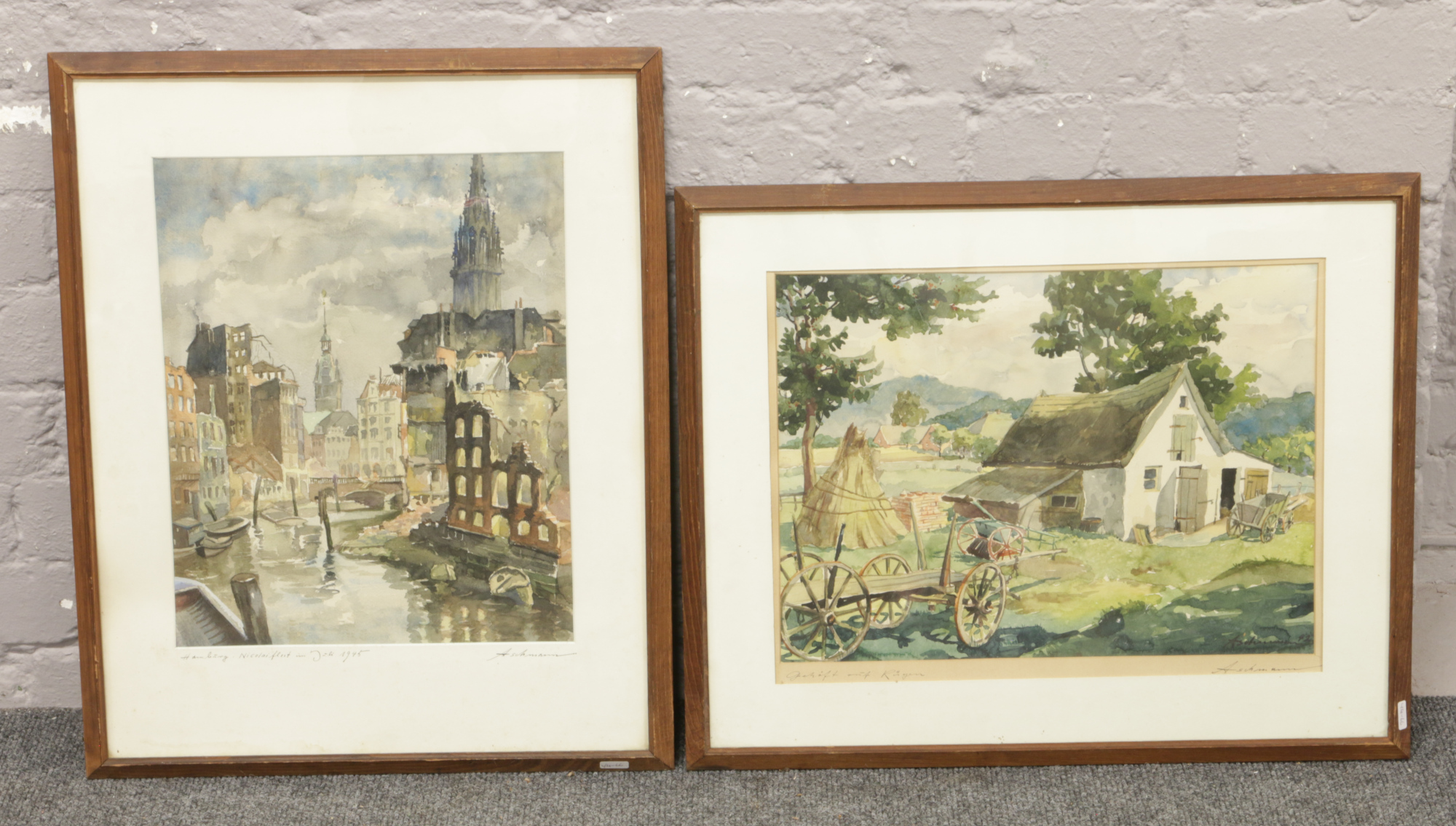 Two continental school framed watercolours signed indistinct, one a rural scene and the other a city