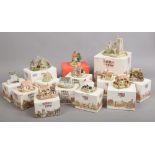 Thirteen boxed Lilliput Lane buildings, mostly with deeds.Condition report intended as a guide