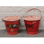 Two vintage metal fire buckets.