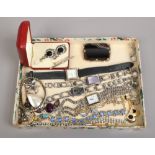 A tray of costume jewellery including white paste set earrings, tennis bracelet, banded agate and