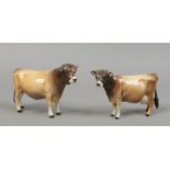 Two Beswick models of Jersey cattle cow and bull including Champion Newton Tinkle and Champion