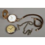 A gold plated half hunter pocket watch with subsidiary seconds on yellow metal and rope Albert