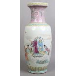 A large 20th century Chinese famille rose vase. Painted with lotus flowers and scrolls to the