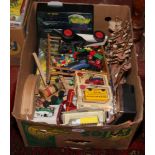 A box of toys including boxed Diecast vehicles, wooden train set, pinball games etc.