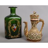 A 19th century Zsolnay Pecs reticulated ewer and cover in need of restoration, along with an