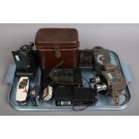 A collection of cameras, Cine cameras and photographic equipment including a Kodak Eastman Vest