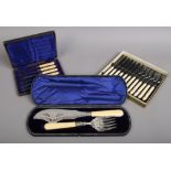 A cased set of Victorian silver plated and ivory fish servers, boxed set of silver plated fish