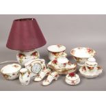 A collection of Royal Albert Old Country Roses bone china to include table lamp, clock, trinket