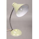 A vintage desk lamp with conical shade.