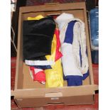 Four signal flags of various colours and sizes.