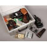 A box of photographic equipment to include Panasonic camera, Comet camera, various light meters